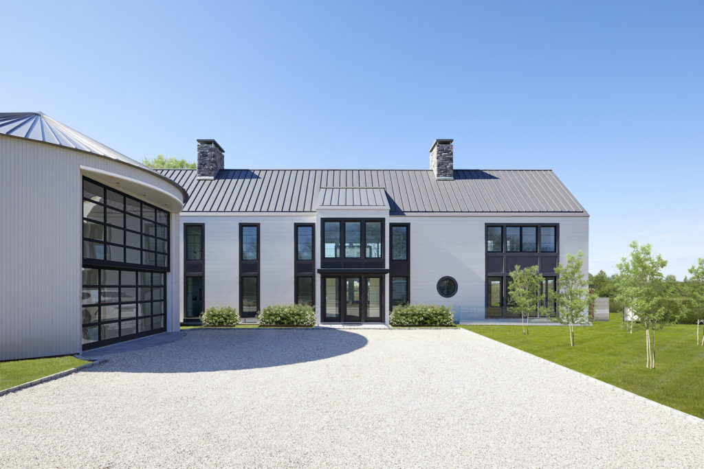 Entry of modern farmhouse in Sagaponack, New York featuring custom TruExterior siding by Duration Moulding & Millwork