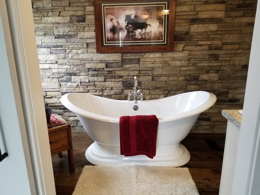 Versetta Stone stone veneer bathroom accent wall